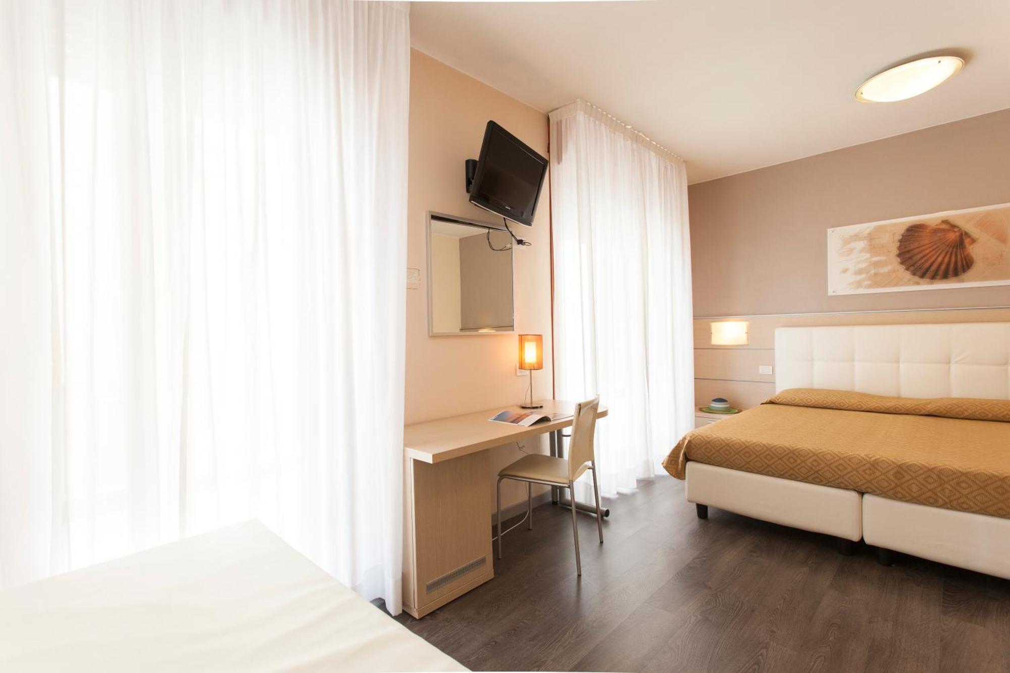 Hotel Orizzonte Лидо-ди-Езоло Номер фото