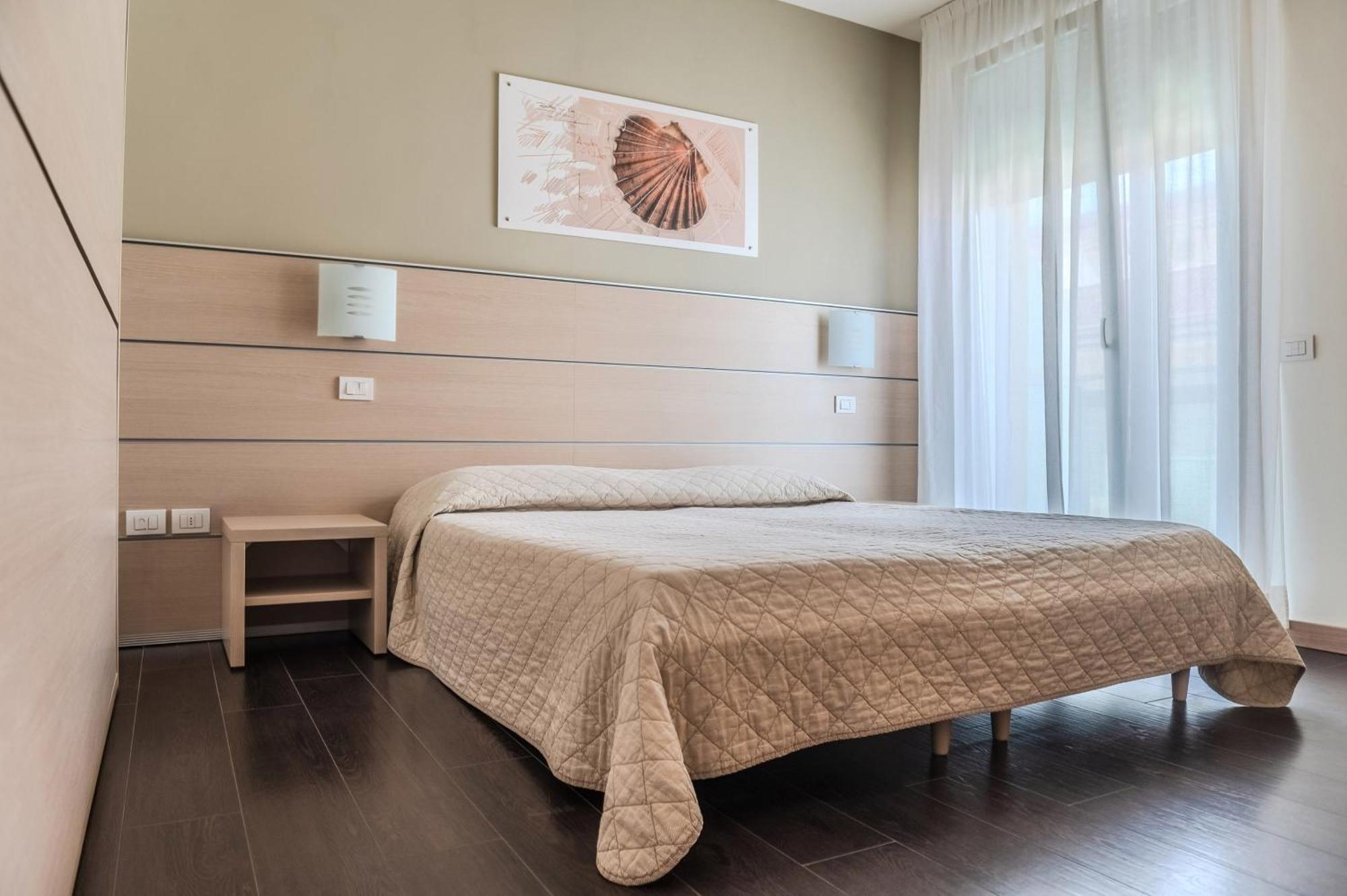Hotel Orizzonte Лидо-ди-Езоло Номер фото