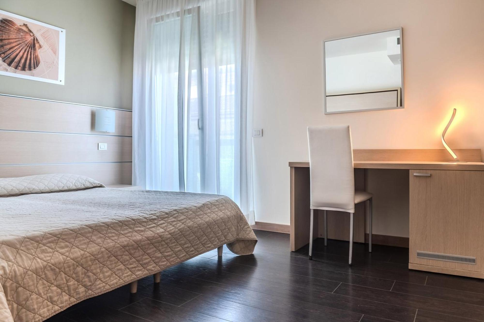 Hotel Orizzonte Лидо-ди-Езоло Номер фото